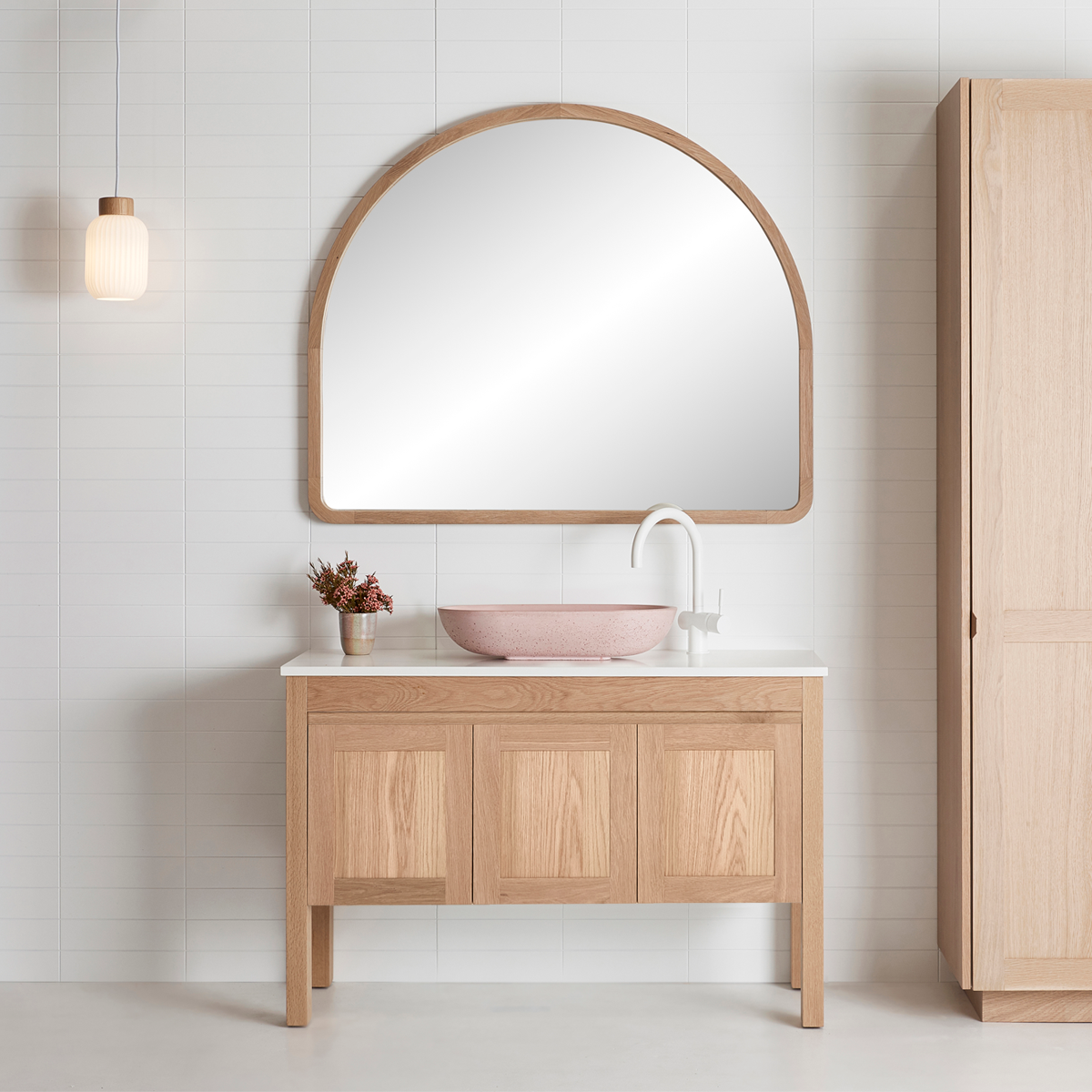 Bathroom Vanity in timber underneath and arch timber framed mirror