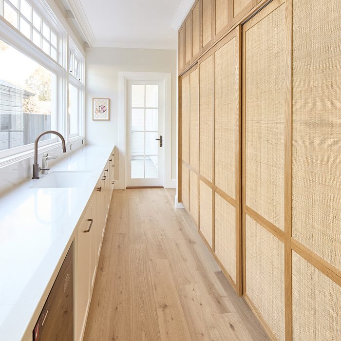Sliding doors and overhead doors in our shaker style with tight weave rattan