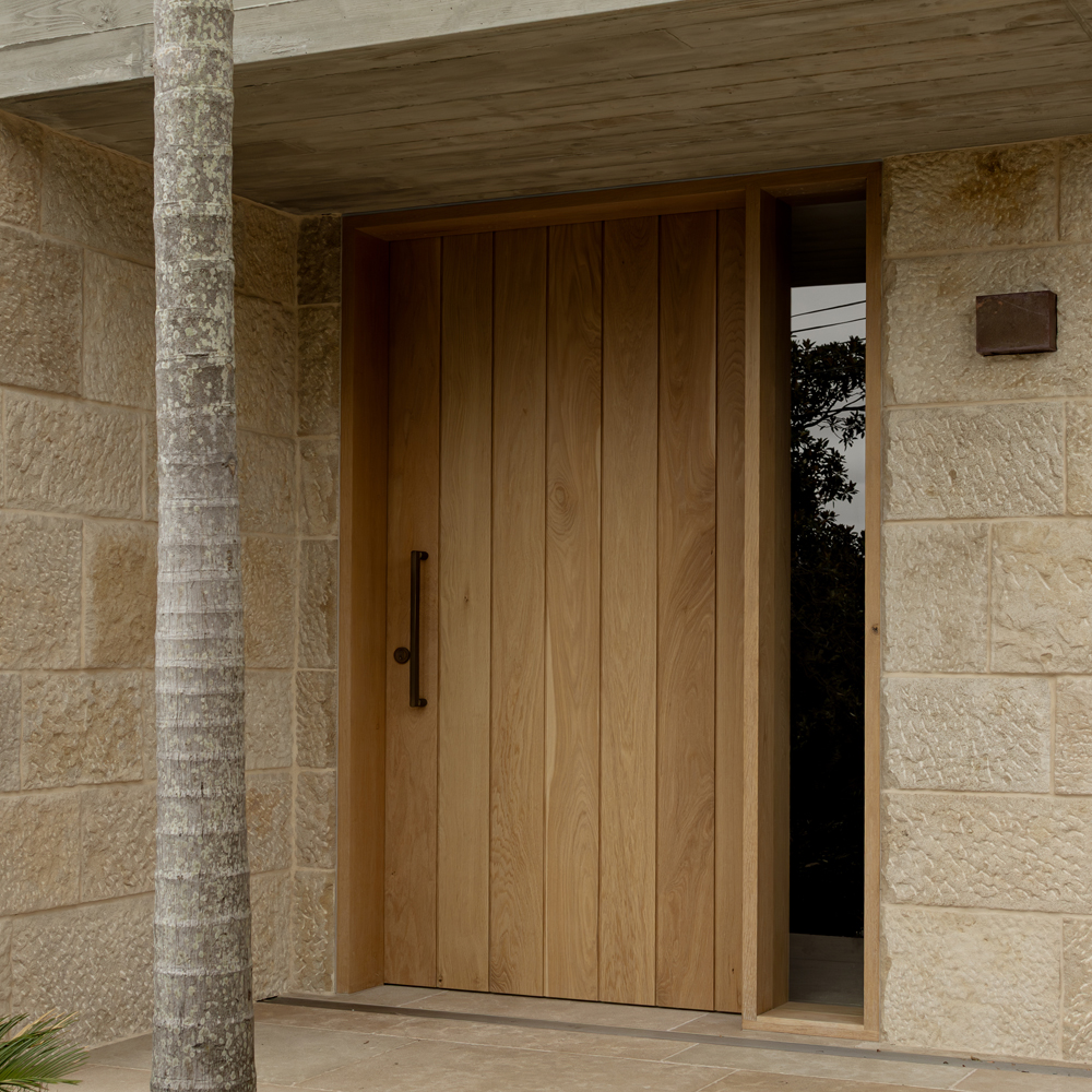 Timber entry door jamb with a large ship entry door