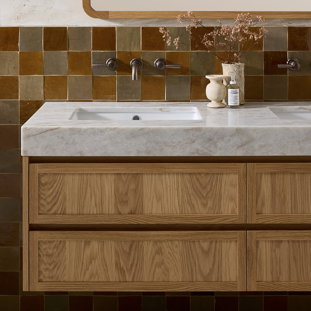 A timber bathroom vanity with an apron vanity top